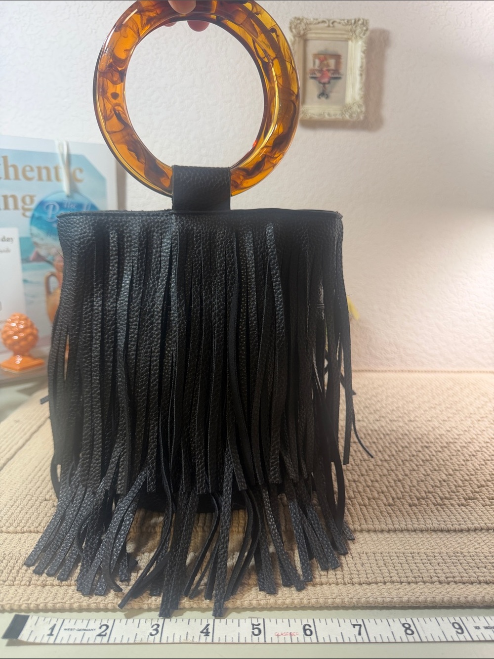 Black Fringed Wristlet with Amber Acrylic Ring Handle